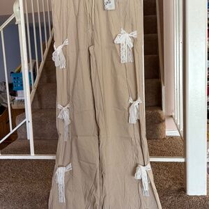 Beige Pants with Bows